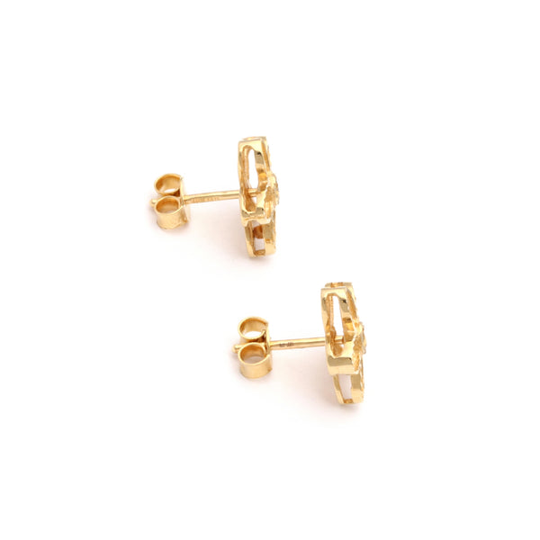 Aretes diseño especial motivo flor en oro amarillo 14 kilates.