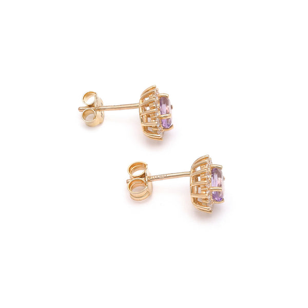 Aretes diseño especial con sintéticos en oro amarillo 14 kilates.
