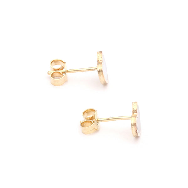 Arete diseño especial con madre perla motivo corazón en oro amarillo 14 kilates.