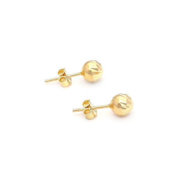 Aretes diseño especial motivo esfera en oro amarillo 14 kilates.
