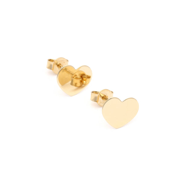 Aretes lisos motivo corazón en oro amarillo 14 kilates.