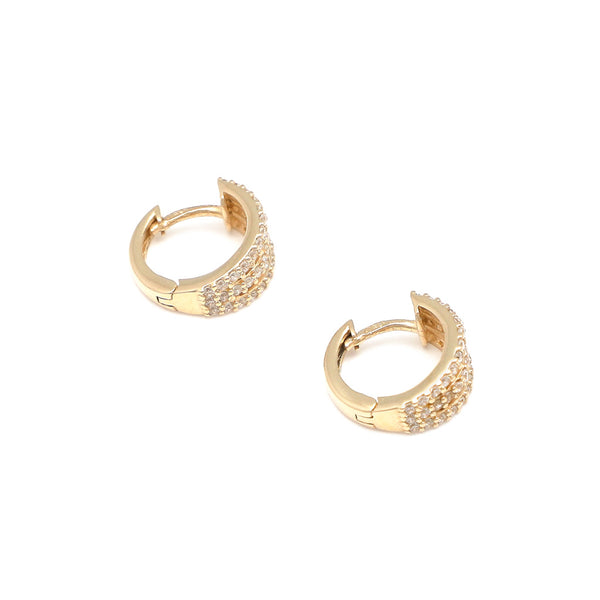 Arracadas diseño especial con circonias en oro amarillo 14 kilates.