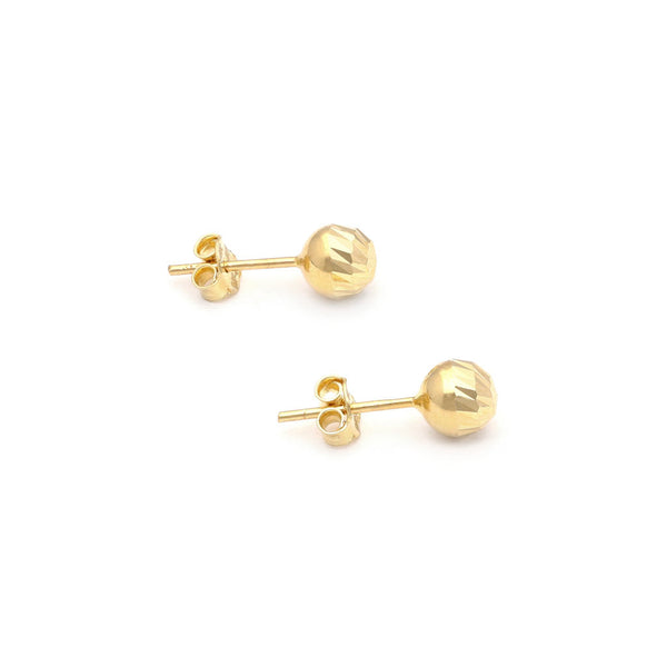 Aretes diseño especial motivo esfera en oro amarillo 14 kilates.