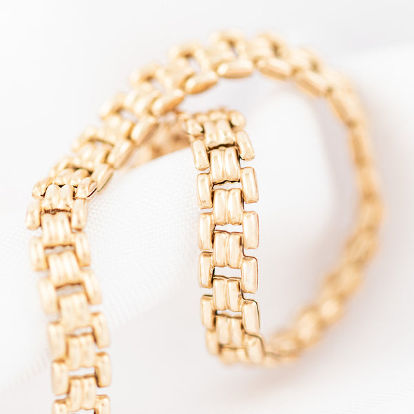 Pulsera eslabón articulado en oro amarillo 14 kilates.