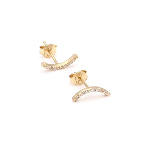 Aretes diseño especial con circonias en oro amarillo 14 kilates.