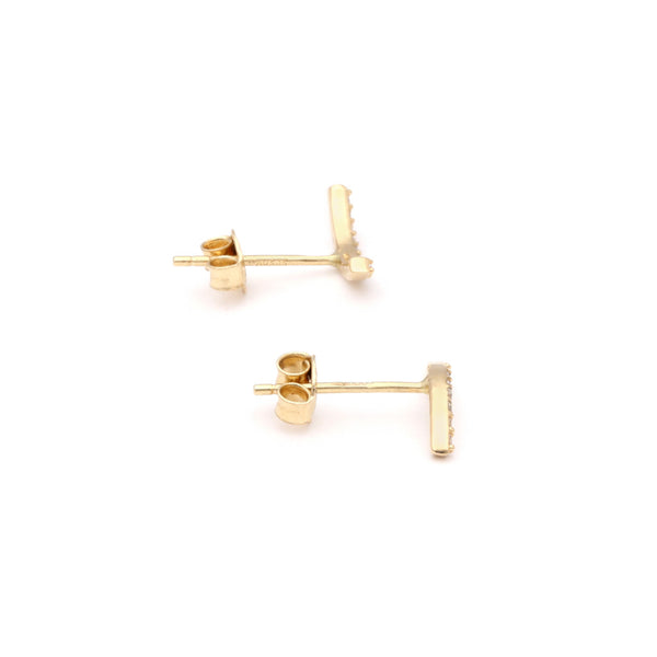 Aretes diseño especial con circonias en oro amarillo 14 kilates.