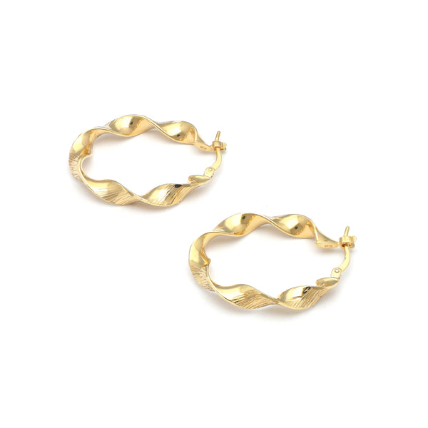 Arracadas torzal en oro amarillo 14 kilates.