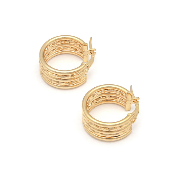Arracadas facetadas en oro amarillo 14 kilates.