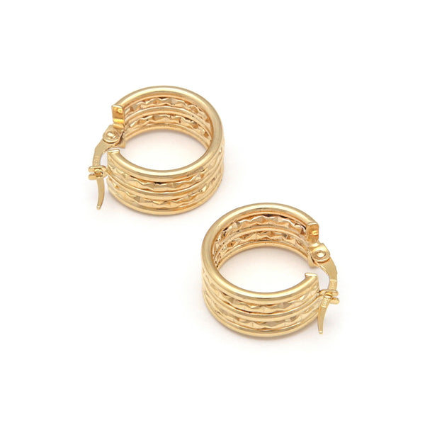 Arracadas facetadas en oro amarillo 14 kilates.