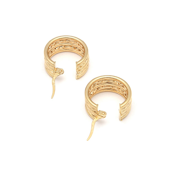 Arracadas facetadas en oro amarillo 14 kilates.