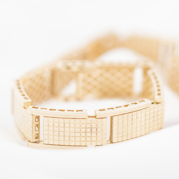 Pulsera eslabón articulado en oro amarillo 14 kilates.