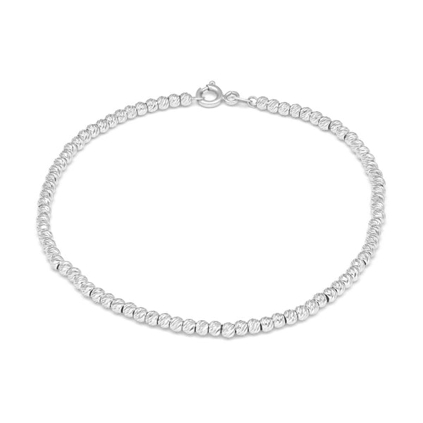 Pulsera eslabón boleado en oro blanco 14 kilates.