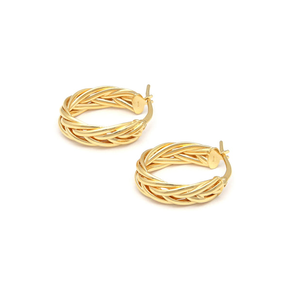 Arracadas trenzadas en oro amarillo 14 kilates.