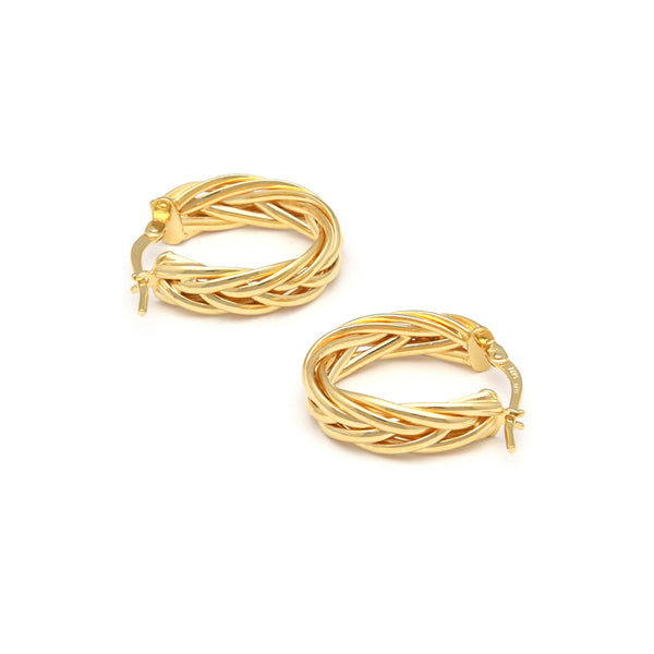 Arracadas trenzadas en oro amarillo 14 kilates.