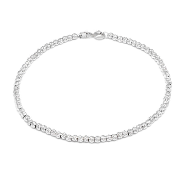 Pulsera eslabón boleado en oro blanco 14 kilates.