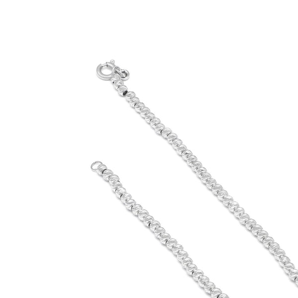 Pulsera eslabón boleado en oro blanco 14 kilates.