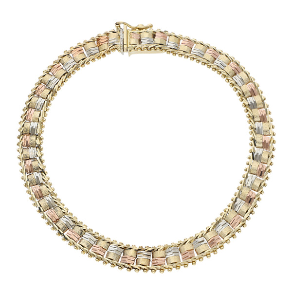 Pulsera eslabón boleado en oro tres tonos 14 kilates.