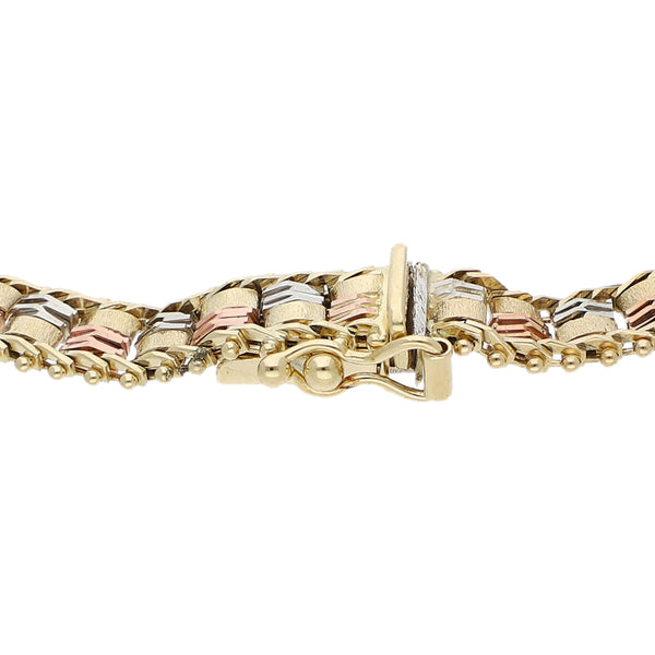Pulsera eslabón boleado en oro tres tonos 14 kilates.