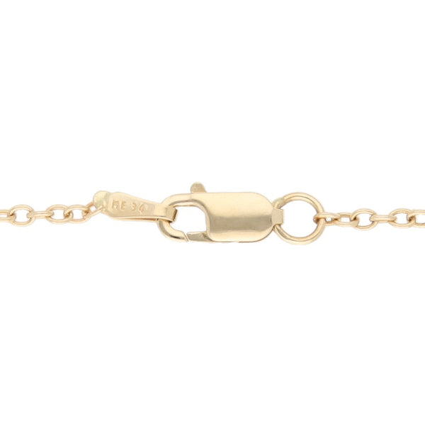 Juego de pulsera eslabón cruzado con aplicación y broqueles diseño especial motivo moño en oro amarillo 14 kilates.