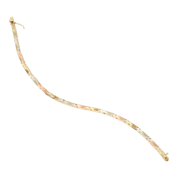 Pulsera eslabón articulado en oro tres tonos 14 kilates.