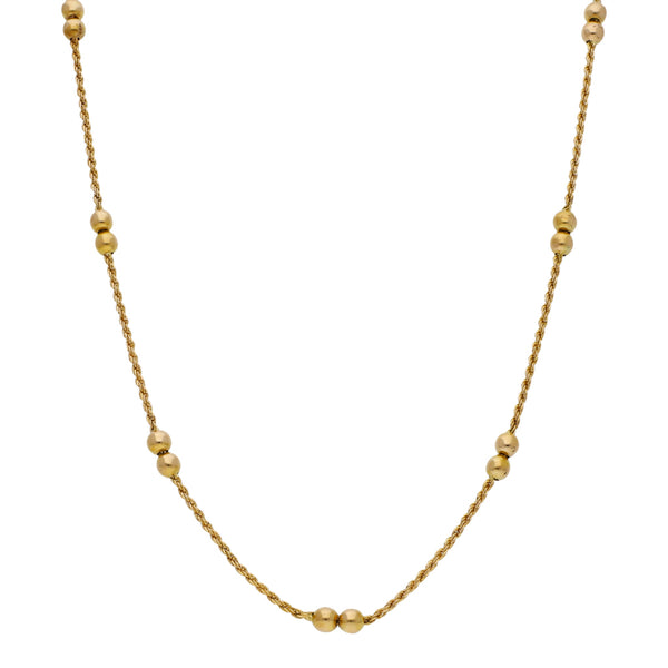 Collar eslabón torzal con aplicaciones motivo esferas en oro amarillo 14 kilates.