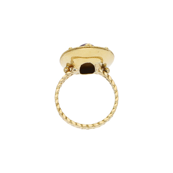 Anillo diseño especial con rubí en oro amarillo 18 kilates.