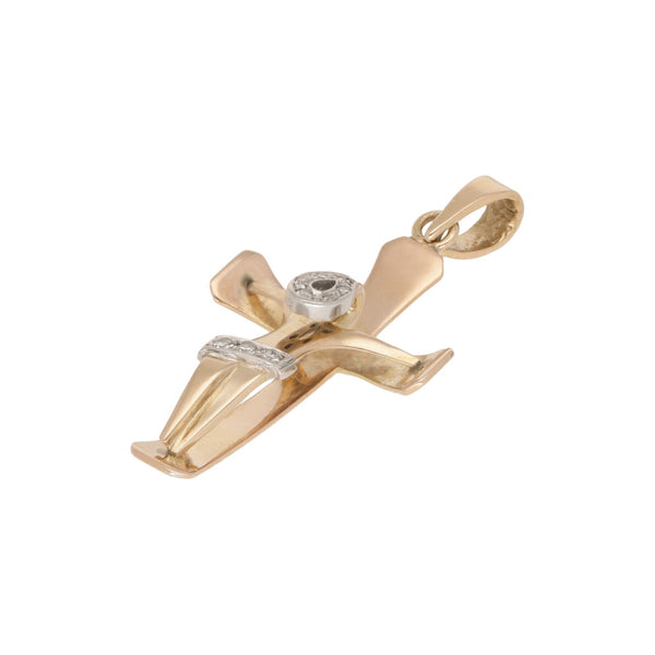 Crucifijo estilizado con diamantes en oro rosa 14 kilates.