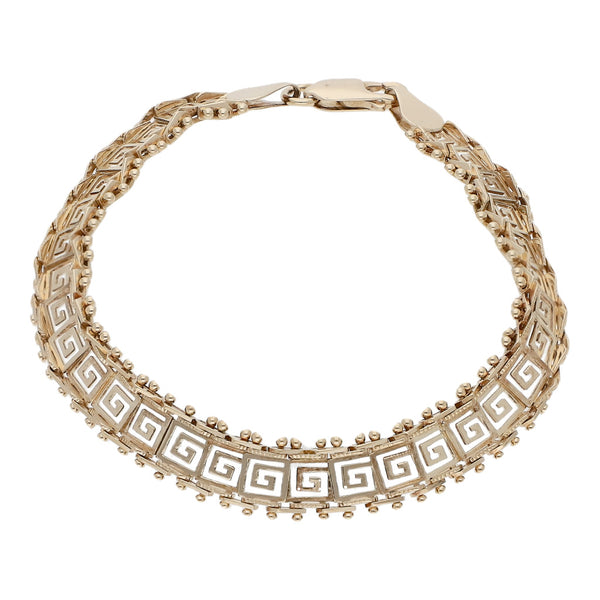 Pulsera eslabón boleado motivo grecas en oro amarillo 14 kilates.