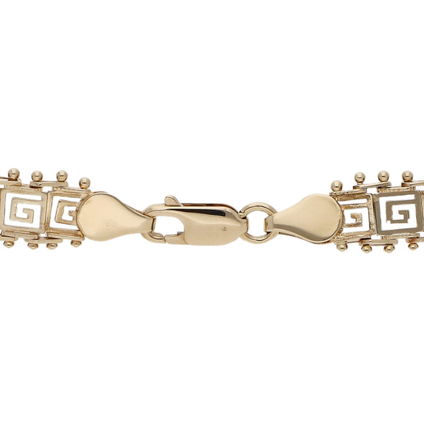 Pulsera eslabón boleado motivo grecas en oro amarillo 14 kilates.