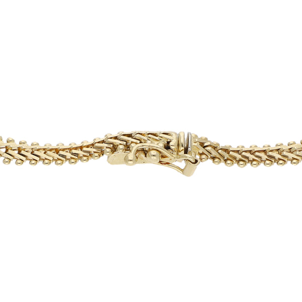 Pulsera eslabón boleado en oro tres tonos 14 kilates.