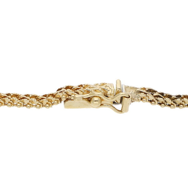 Pulsera eslabón boleado en oro tres tonos 14 kilates.