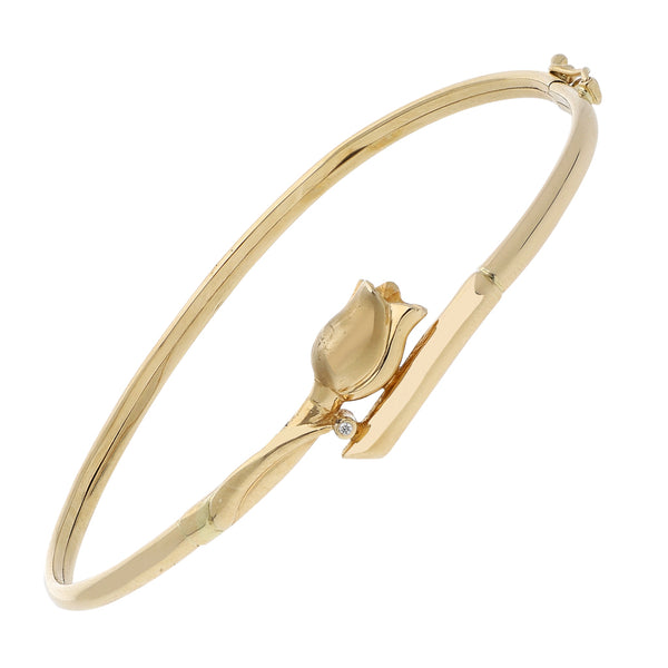 Pulsera de arillo articulada motivo rosa con diamante en oro amarillo 14 kilates.
