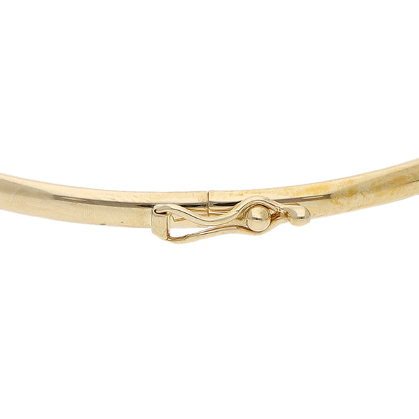 Pulsera de arillo articulada motivo rosa con diamante en oro amarillo 14 kilates.