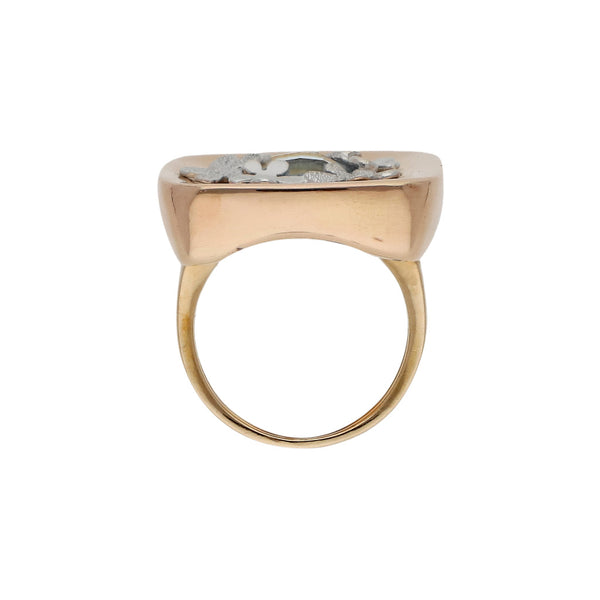Anillo hueco con sintético en oro dos tonos 14 kilates.