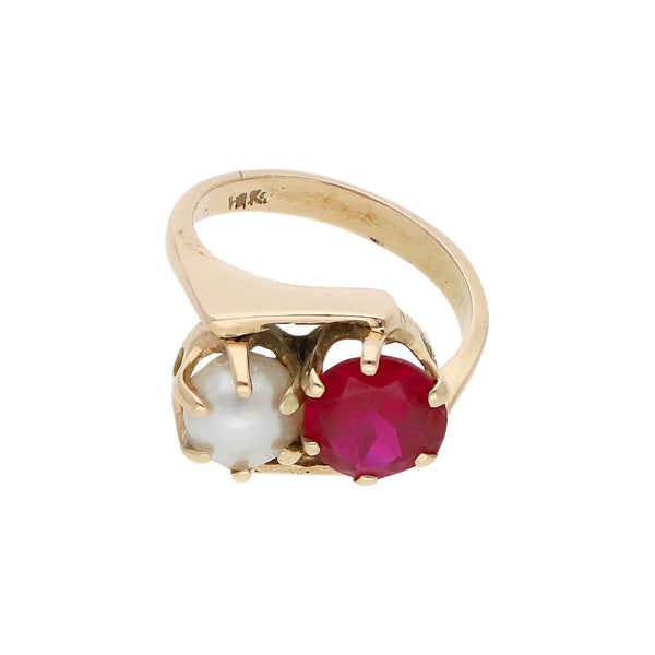 Anillo diseño especial con perla y sintético en oro rosa 14 kilates.
