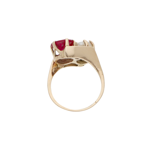 Anillo diseño especial con perla y sintético en oro rosa 14 kilates.