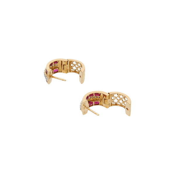 Arracadas articuladas con diamantes y rubíes en oro rosa 14 kilates.