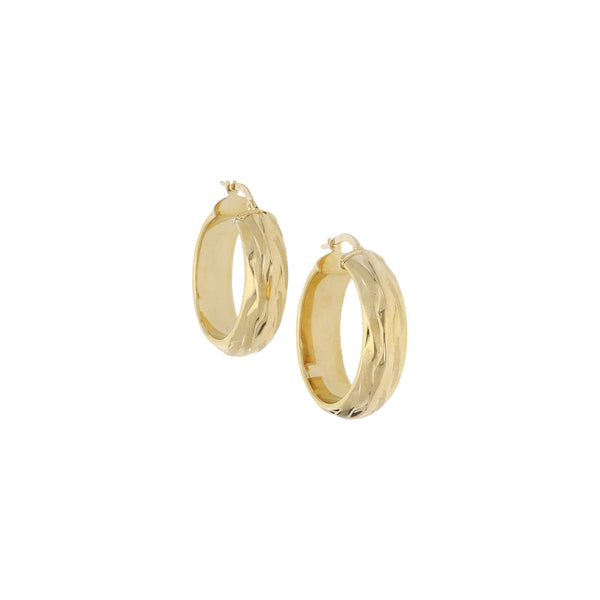 Arracadas huecas en oro amarillo 14 kilates.