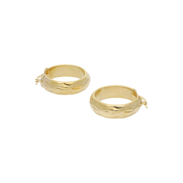 Arracadas huecas en oro amarillo 14 kilates.