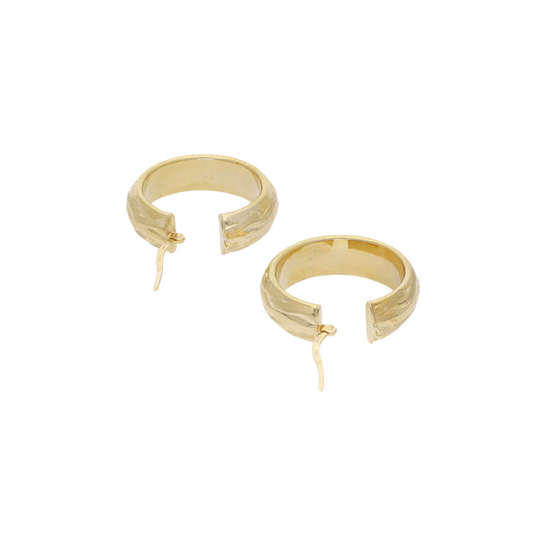 Arracadas huecas en oro amarillo 14 kilates.