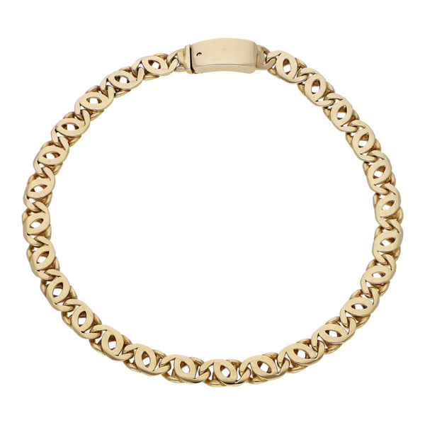 Pulsera eslabón nudo egipcio en oro amarillo 14 kilates.