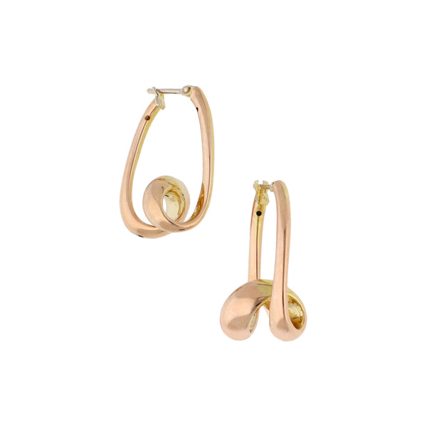 Arracadas estilizadas en oro rosa 14 kilates.
