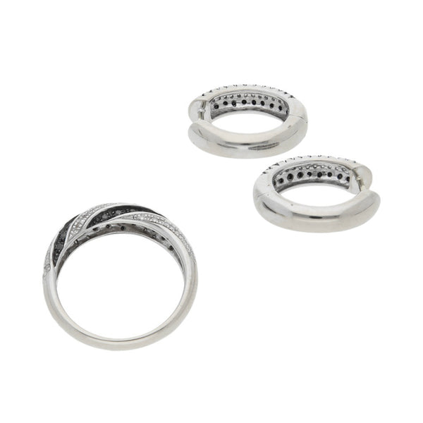 Juego de anillo y arracadas diseño especial con diamantes en oro blanco 14 kilates.