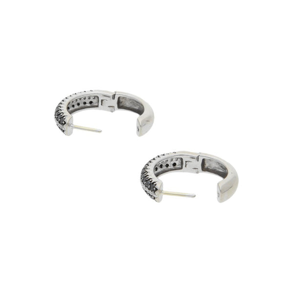 Juego de anillo y arracadas diseño especial con diamantes en oro blanco 14 kilates.