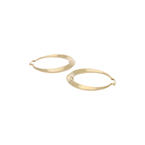 Arracadas huecas en oro amarillo 14 kilates.