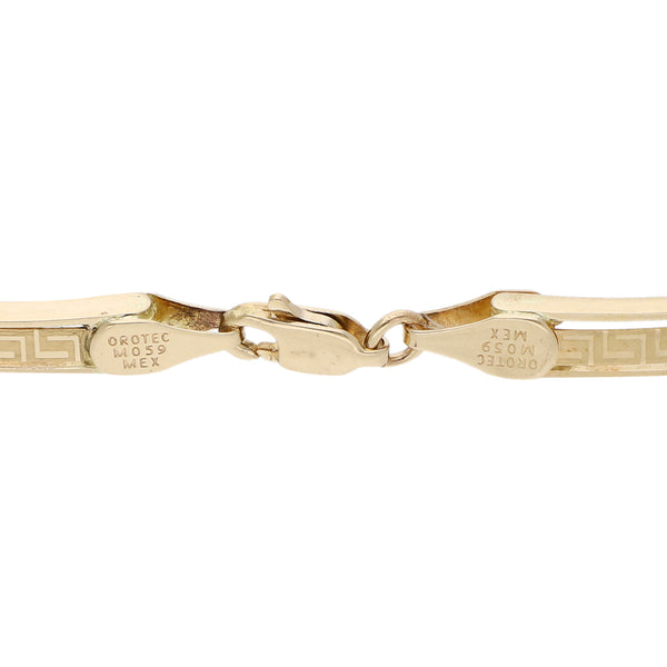 Pulsera eslabón articulado en oro tres tonos 14 kilates.