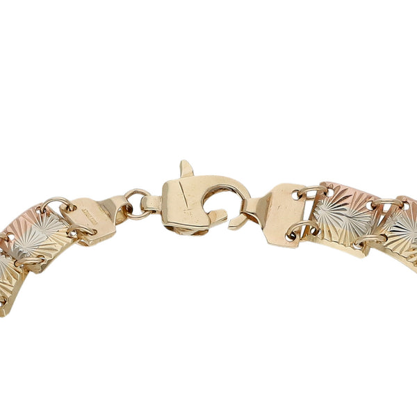 Pulsera eslabón laminado labrado en oro tres tonos 14 kilates.