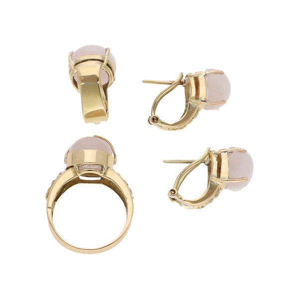 Juego de aretes, dije y anillo diseño especial con cuarzo rosa y circonias en oro amarillo 14 kilates.
