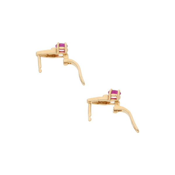 Juego de anillo, aretes y dije diseño especial con diamantes y rubís en oro amarillo 14 kilates.