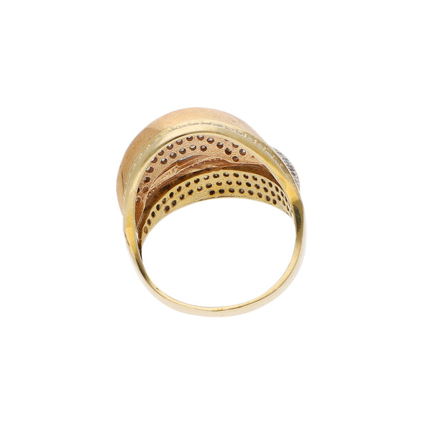 Anillo diseño especial con sintéticos en oro dos tonos 14 kilates.